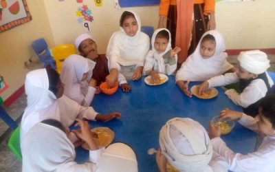 Children celebrating at the Mohsin Quran Foundation closing event.